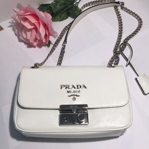 Authentic Prada handbag with chain strap.
